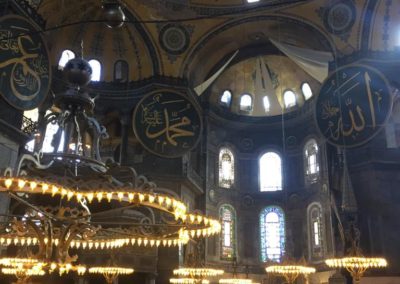 The picture shows the details inside of the Hagia Sophia and the Seraphim mosaics with six wings next to the dome which is known as a most important angel in Jewish culture..